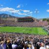 Fans cheering at CU football game at Folsom Field