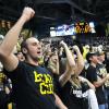 Fans cheer on the men's basketball team