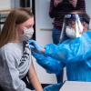 Student receives a COVID-19 vaccine on campus