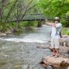 Ryan Watson fishes in Boulder Creek