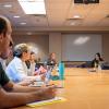 Leslie Blood leads an in-person seminar for graduate students pre-COVID