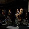 Panelists speak at a real estate event on campus