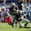 CU's Mikial Onu intercepts the ball against Arizona