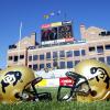 CU football helmets on Folsom Field in front of Dal Ward