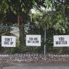 Signs that read 'Don't give up' 'You are not alone' 'You matter'