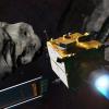 Artist's depiction of spacecraft about to slam into an asteroid
