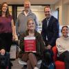 Deming Center staff accepting award