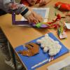 kids create book in the Literacy and Media Lab