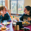 Students eat in dining center on campus