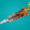 Vaccine vial filled with dirt