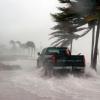 Truck drives on flooded street in Key West, Florida