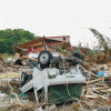 Car overturned in earthquake aftermath