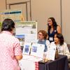Campus community members visit a booth at the sustainability summit