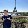 Noah Bernstein in front of the Eiffel Tower