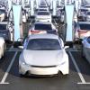 A fleet of electric vehicles being charged simultaneously.