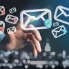 person selecting an email icon