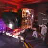 Engineers work on the EMM spacecraft in a cleanroom