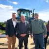 Evan Thomas, director of the Mortenson Center; Gov. Jared Polis and Sen. Cleave Simpson in Alamosa, Colorado