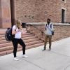 students talk on campus 