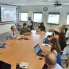 Faculty members discussing LMS initiative