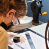 A person working on film preservation