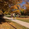 Students walking on campus during the fall