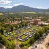 Tables and campus community members fill Farrand Field during the Be Involved Fair