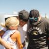 Family of three embraces during move-in