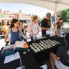 A Journey Leader tables at a Fall Welcome event