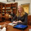 A GWC Fellow talking with another person