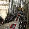 Members of the British royal family follow behind the coffin of Queen Elizabeth II as it is carried out of Westminster Abbey