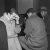 Basketball players, arrested for bribery in 1951, at a police station