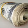 Roll of cash | Photo by 401kcalculator.org