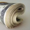Roll of cash | Photo by 401kcalculator.org