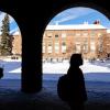 Silhouettes of students on a snowy day