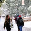Students walking on snowy campus