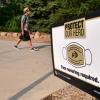 A person walks near the UMC during the first week of classes in the midst of the COVID-19 pandemic. (Photo by Casey A. Cass/University of Colorado)