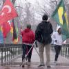 Students raise international flags on campus for Conference on World Affairs