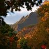 The majestic Flatirons above Boulder framed in fall colors. 