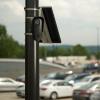 A Flock Safety camera in a parking lot