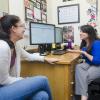 Academic advisor meets with student