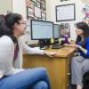 Academic advisor meets with student