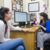 Academic advisor meets with student