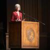 Jennifer Doudna stands on stage at a podium
