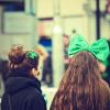 Two people dressed up for St. Patrick's Day celebrations
