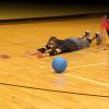 Two players in eyeshades play goalball