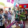Charlie visits with customers at Boulder Farmer's Market