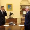Former White House counsel Gregory B. Craig (right) with President Obama