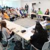 Panelists and attendees discuss gun violence prevention.