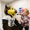 Chip the buffalo mascot getting checked out at the student health center